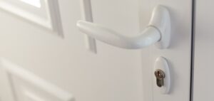 Porte entrée PVC détail poignet