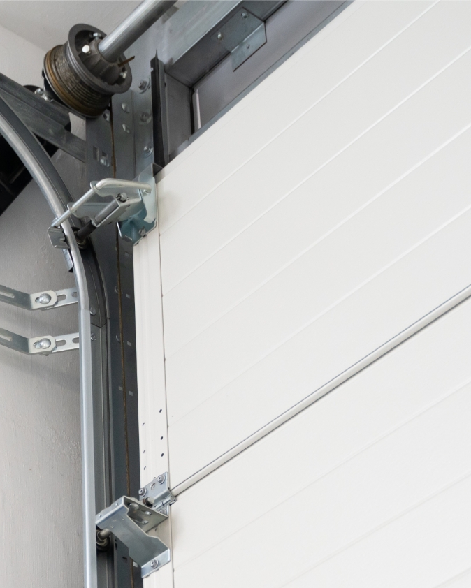 Installation porte garage enroulable